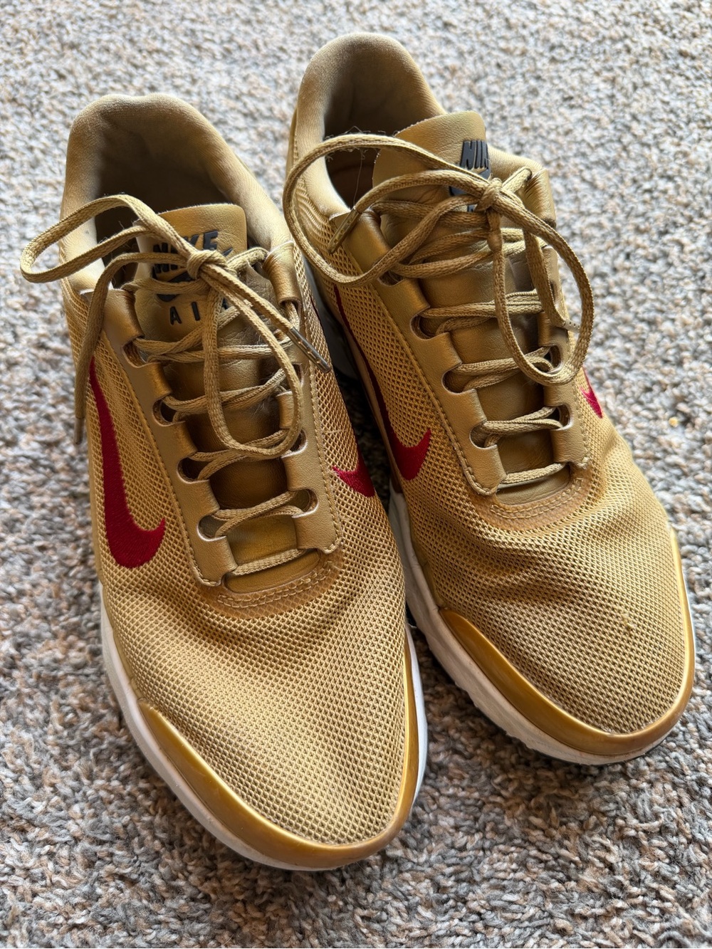 Nike Women’s Gold Mesh Sneakers with Red Swoosh